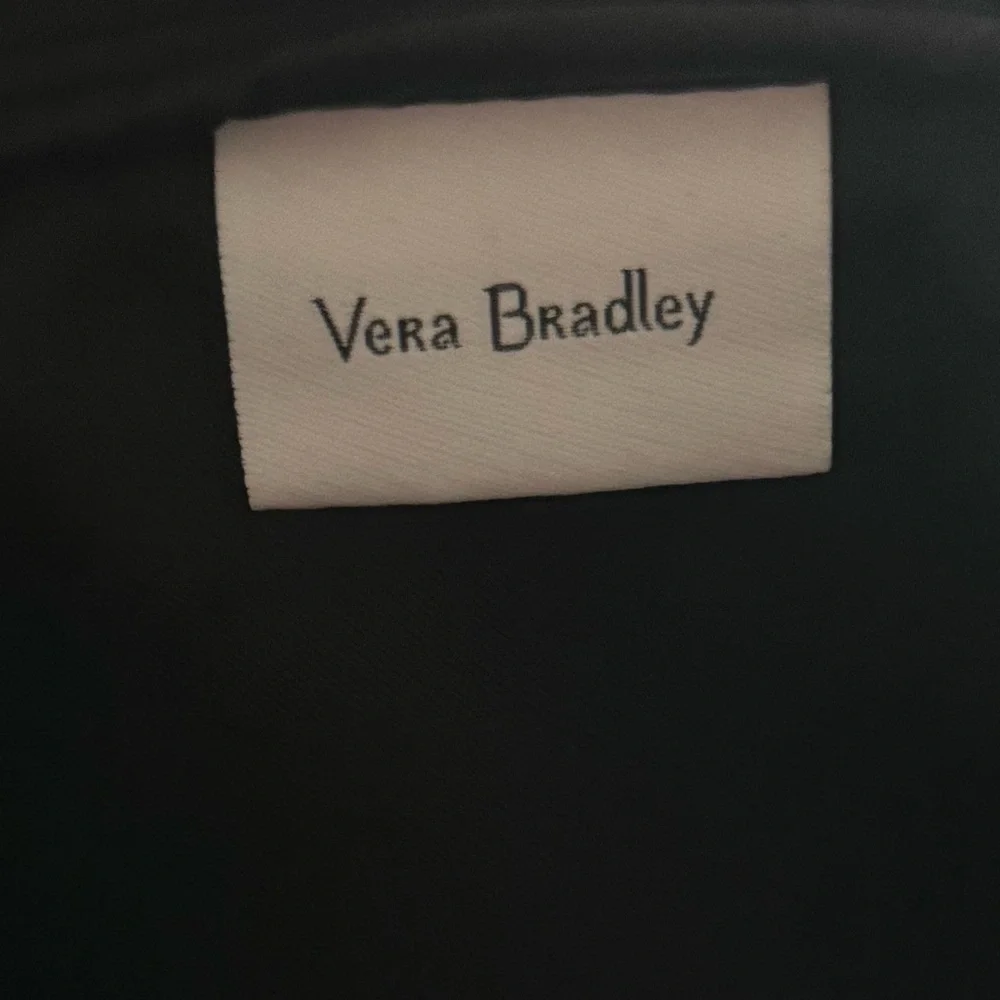 Vera Bradley Black and White Quilted laptop sleeve with zipper closure.